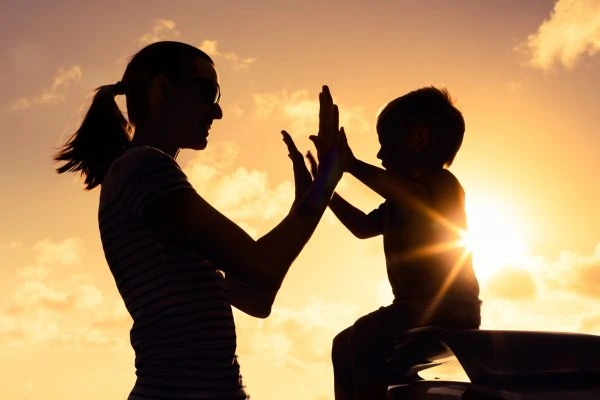 Image of happy mother and child after resolving child arrangements Kettering